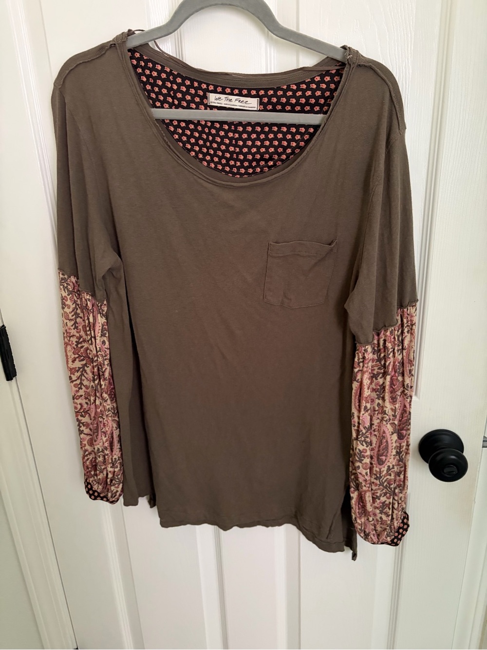 We The Free Olive Green with Floral/Paisley print Sleeves.